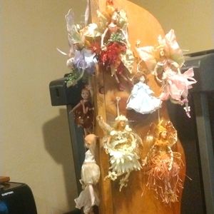 Porcelain doll and fairy ornaments